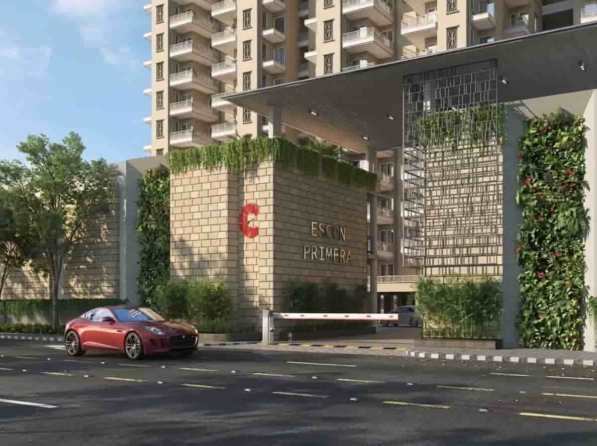Entrance Plaza — Escon Primera grand entrance with green walls
